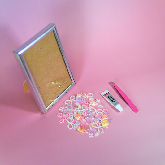 Doe-het-zelf fotolijst pakket met unieke roze accenten